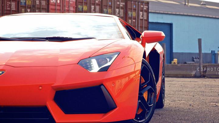 Front Pose Of Lamborghini Aventador In Red